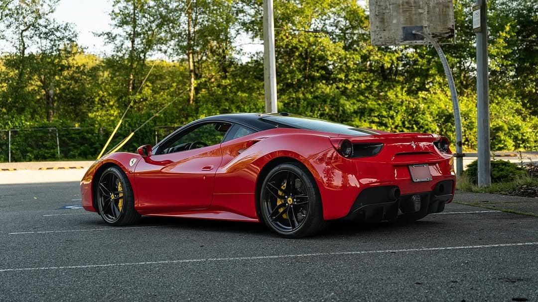 Rear view of a red Ferrari from Ceramic Surgeon's website